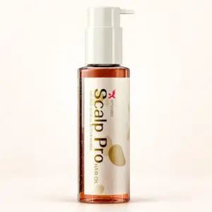 Cream X Emirates Scalp Pro Hair Oil pump bottle